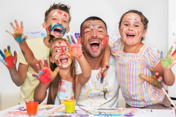 family playing with paint