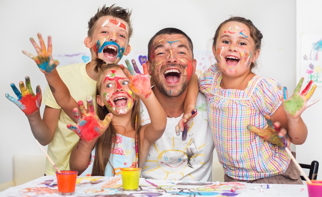 family playing with paint