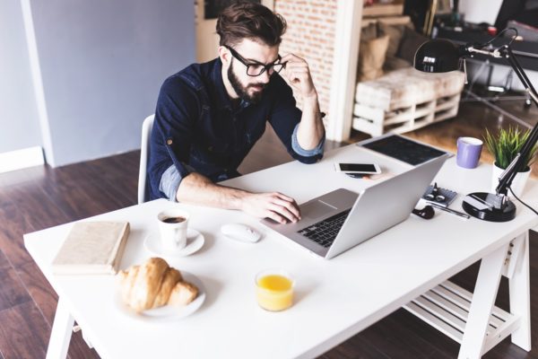 man working in his office