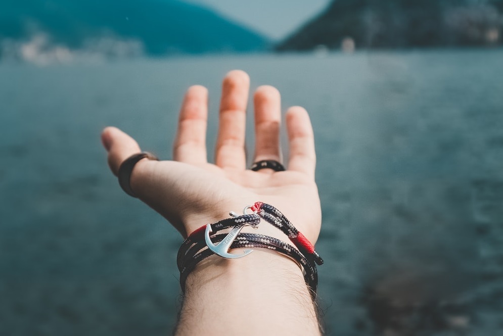 hand with rope bracelet